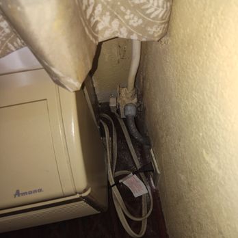 Quality Inn - dirty by the AC unit - Hotels Near Me - Blytheville, Arkansas Quality Inn - dirty by the AC unit - Hotels Near Me - Blytheville, Arkansas