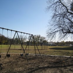 Pecan Park - Swings and Baseball backstop