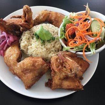 DB Grill - Duck Butt Chicken:  Fried dry rubbed Cornish hen (choice of half or full hen) w/duck fat fried rice, pickled onions, & a side salad - New American Near Me - Kapolei, Hawaii