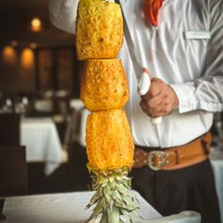 NaBrasa Brazilian Steakhouse - Grilled Pineapple with cinnamon and sugar served tableside by our Gauchos