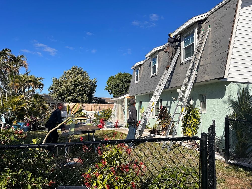 Slide of Whitby Roofing