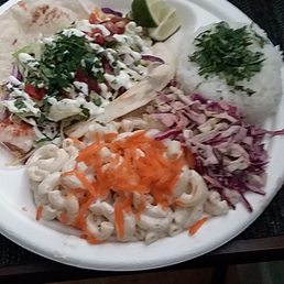 Mahi taco plate with slaw, mac salad, and cilantro rice. Mahi taco plate with slaw, mac salad, and cilantro rice.