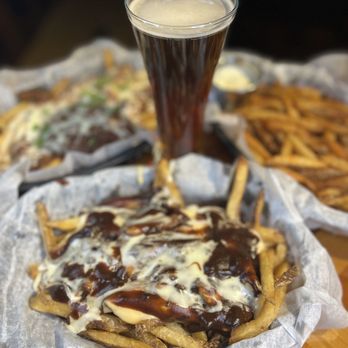 The Social Bar + Kitchen - Disco Fries. Brown mushroom gravy, white cheddar cheese sauce and hand cut fries. It doesn't get much better than this!! - New American Near Me - New London, Connecticut The Social Bar + Kitchen - Disco Fries. Brown mushroom gravy, white cheddar cheese sauce and hand cut fries. It doesn't get much better than this!! - New American Near Me - New London, Connecticut