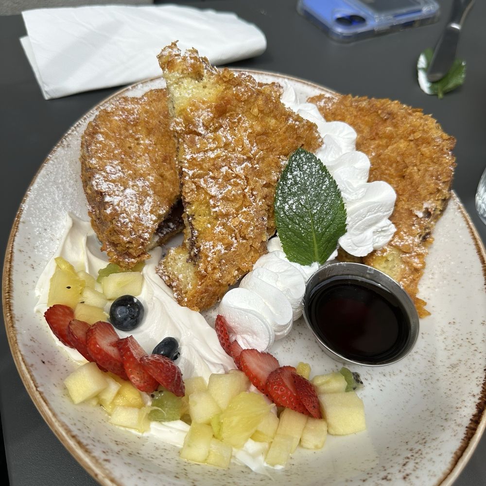 Rooster Cafè - Nutella French Toast - Breakfast & Brunch Near Me - Florence, FI Rooster Cafè - Nutella French Toast - Breakfast & Brunch Near Me - Florence, FI
