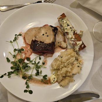 Bass Street Chop House - New York strip with poivre sauce - Steakhouses Near Me - Moline, Illinois Bass Street Chop House - New York strip with poivre sauce - Steakhouses Near Me - Moline, Illinois