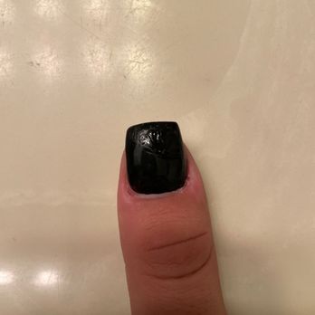 Ninety's Nails - Left this one completely wrinkled and worse of all and cut the cuticles on my thumb - Nail Salons Near Me - Traverse City, Michigan