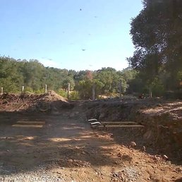 Our yard was almost completely made up of boulders.  We live on an old quarry, and they literally had to jackhammer up the whole area!