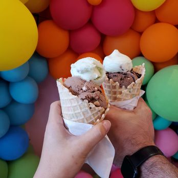 The Scoop - two people holding ice cream cones - Ice Cream & Frozen Yogurt Near Me - Spokane, Washington The Scoop - two people holding ice cream cones - Ice Cream & Frozen Yogurt Near Me - Spokane, Washington
