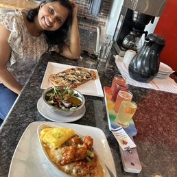 My friend enjoying her mushroom pizza. And my chicken Mac n cheese.