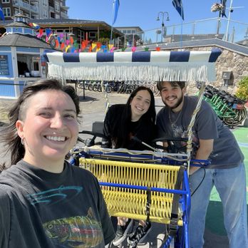 Wheel Fun Rentals - Point Ruston - 3 people on single surrey cart - Bike Rentals Near Me - Tacoma, Washington Wheel Fun Rentals - Point Ruston - 3 people on single surrey cart - Bike Rentals Near Me - Tacoma, Washington