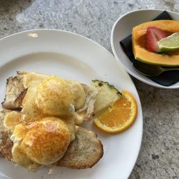 Crab Benedict and side of papaya Crab Benedict and side of papaya