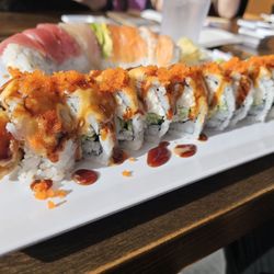 iSushi & Teriyaki - Spider Roll (front) and Rainbow Roll (behind)
