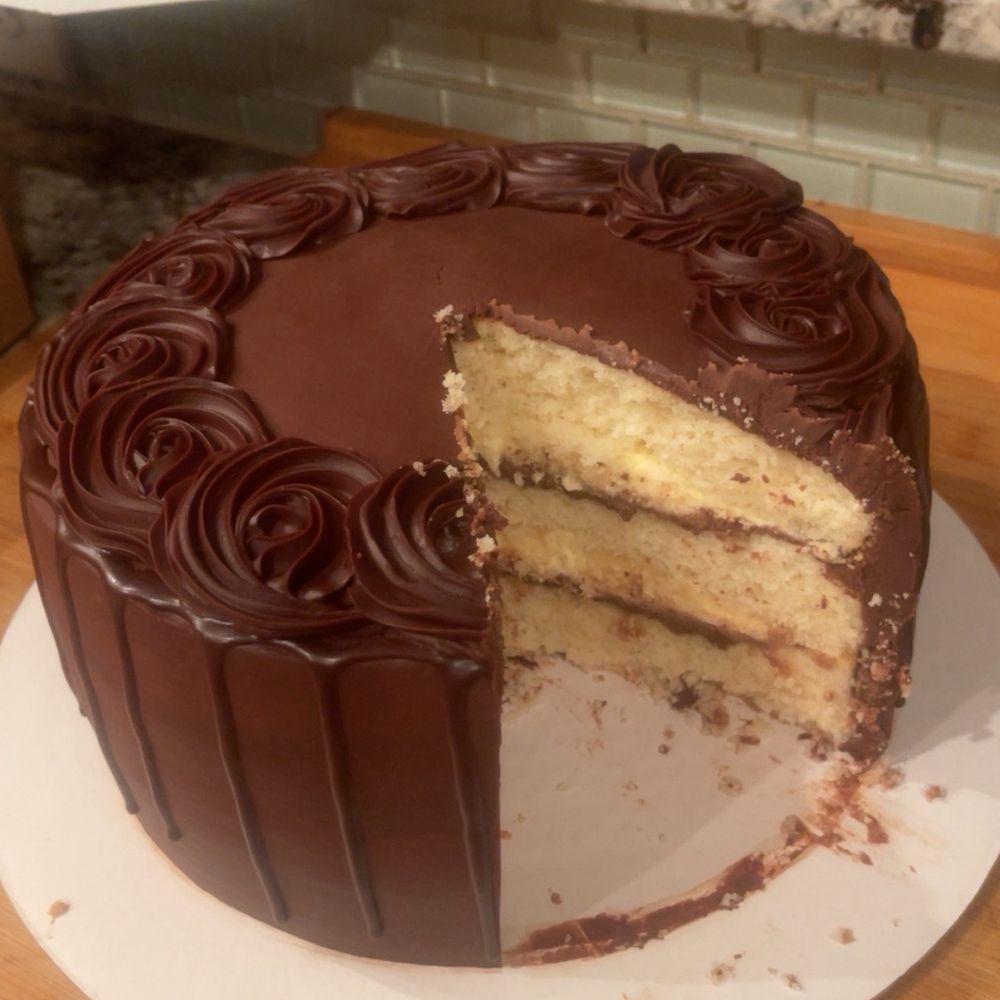 Evie's Bistro and Bakery - Boston Cream Cake - 9" Round - New American Near Me - Roanoke, Virginia Evie's Bistro and Bakery - Boston Cream Cake - 9" Round - New American Near Me - Roanoke, Virginia