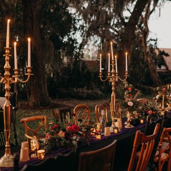 Soirees for Days - "A feast for the spirits--dark florals, flickering candlelight, and woodland whispers gathered in reverence and romance." - Floral Designers Near Me - St. Augustine, Florida