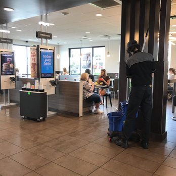 McDonald's - a man cleaning the floor of a restaurant - Fast Food Near Me - Coopersville, Michigan McDonald's - a man cleaning the floor of a restaurant - Fast Food Near Me - Coopersville, Michigan