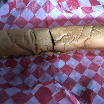 A Matter of Steak - a sandwich on a red and white checkered paper - Cheesesteaks Near Me - Dublin, Ohio A Matter of Steak - a sandwich on a red and white checkered paper - Cheesesteaks Near Me - Dublin, Ohio