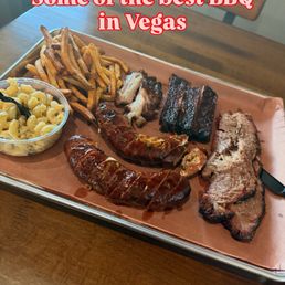 Poblano Mac n cheese and fries. Oaxaca Poblano pepper sausages. Fatty moist brisket. A couple of STL pork ribs. Some pork belly.