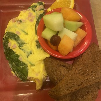 Toasted Mango Cafe - Omelette with spinach, ham, and cheese. - Cafes Near Me - Sarasota, Florida