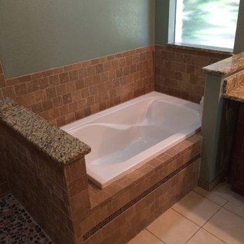 Ambler Enterprises - a bathtub in a bathroom - General Contractors Near Me Ambler Enterprises - a bathtub in a bathroom - General Contractors Near Me