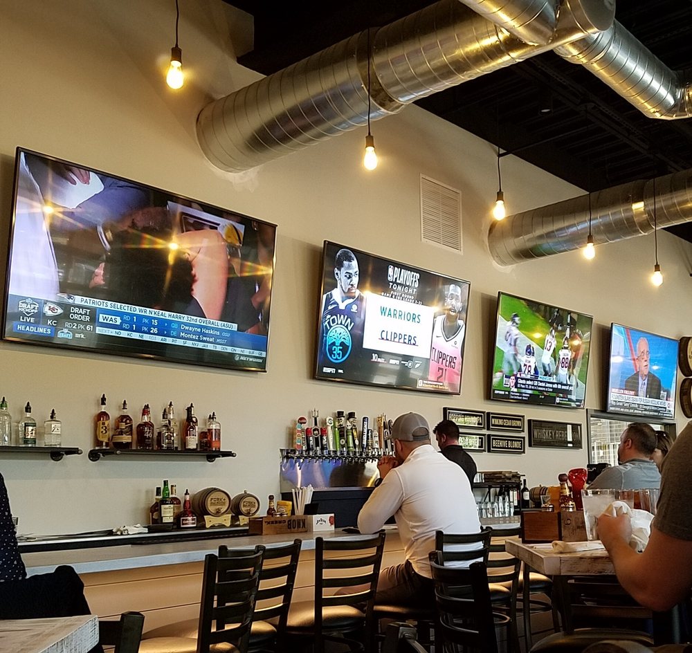 bar with lots of large screens Yelp