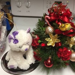 My daughters Gorgeous Christmas Flower Arrangement that Cynthia's Flower Shop did!!! Thank You so Very Much for Stepping in.