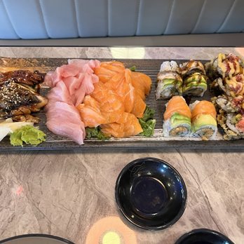 Okinawa Asian Cuisine - Selection of sashimi and sushi rolls - Asian Fusion Near Me - Arlington, Texas Okinawa Asian Cuisine - Selection of sashimi and sushi rolls - Asian Fusion Near Me - Arlington, Texas