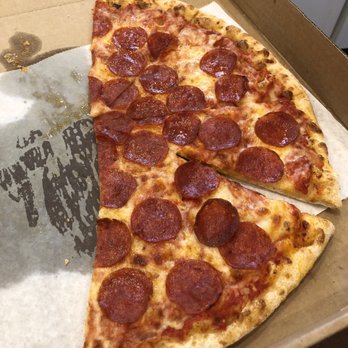 Amore Pizza & Kitchen Medford - Half eaten pepperoni pizza. - Pizza Near Me - Medford, Massachusetts Amore Pizza & Kitchen Medford - Half eaten pepperoni pizza. - Pizza Near Me - Medford, Massachusetts