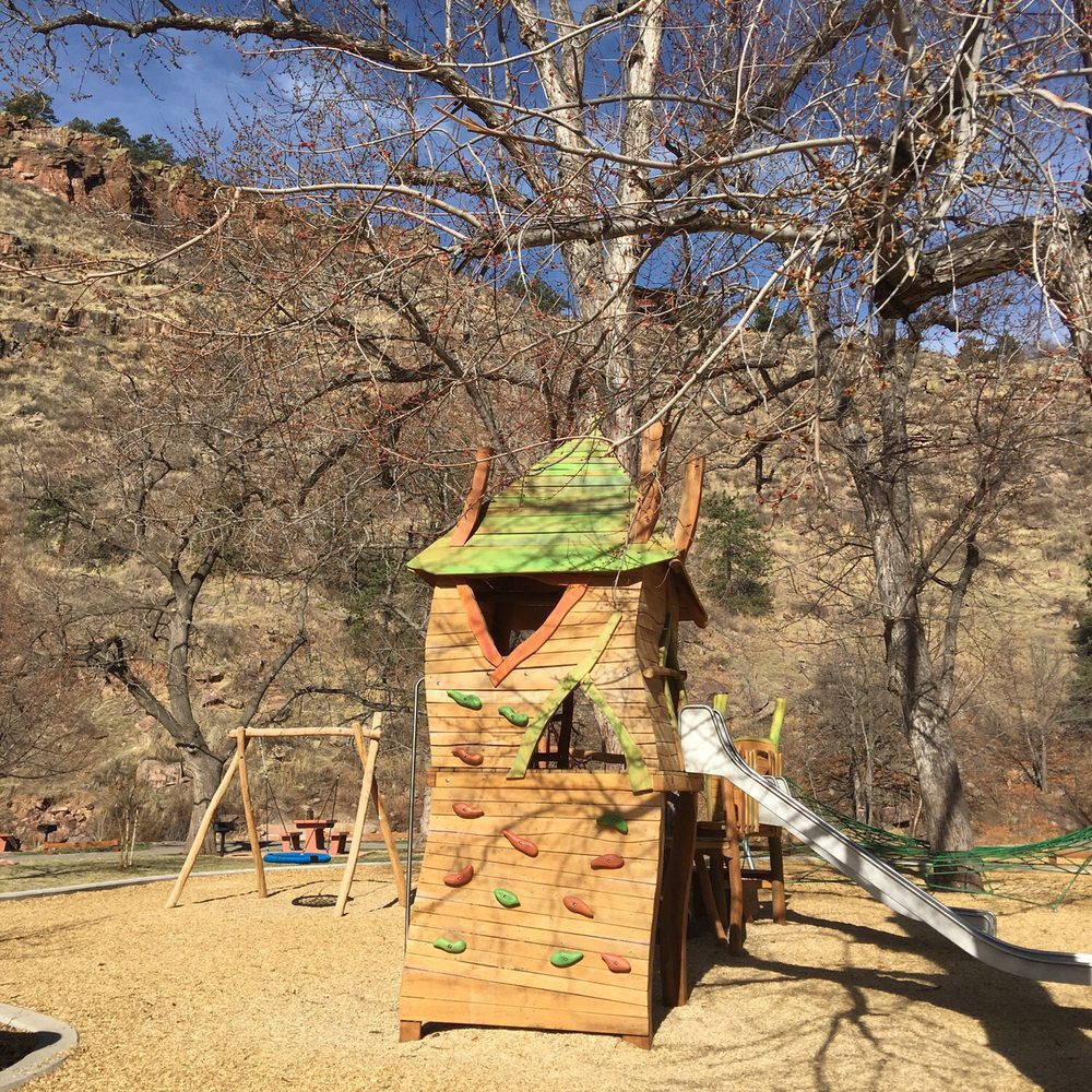 The main play area with the tree house rock wall The main play area with the tree house rock wall