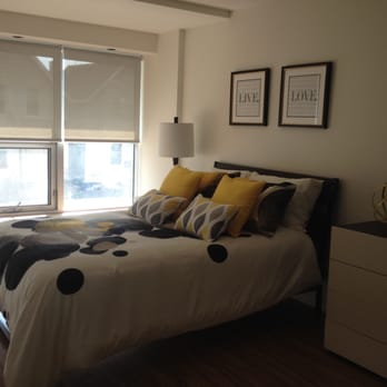 LIV Apartments - Bedroom with large windows and roller shades - Apartments Near Me - Ottawa, Ontario LIV Apartments - Bedroom with large windows and roller shades - Apartments Near Me - Ottawa, Ontario
