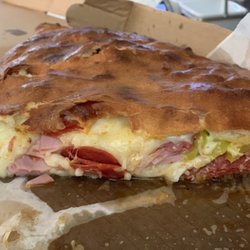 New York Pizza & Pasta - Half of the Large Italian Stromboli with salami and banana peppers.