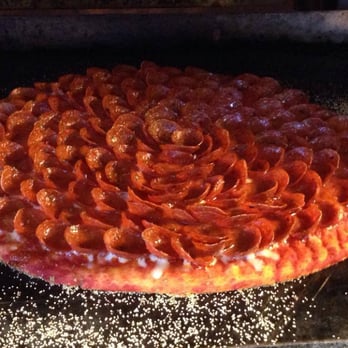 Massey's Pizza - a pepperoni pizza in the oven - Pizza Near Me - Lancaster, Ohio Massey's Pizza - a pepperoni pizza in the oven - Pizza Near Me - Lancaster, Ohio