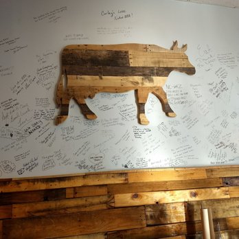 Naked Q BBQ - Dining room wall with customer comments - Barbeque Near Me - Phoenix, Arizona