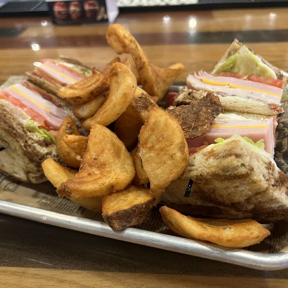 Driftwood - Club sandwich on rye with tasty fries - New American Near Me - Ogallala, Nebraska Driftwood - Club sandwich on rye with tasty fries - New American Near Me - Ogallala, Nebraska