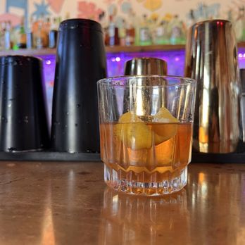 Bar Margaret - a glass of whiskey on a bar counter - Bars Near Me - Greenville, South Carolina Bar Margaret - a glass of whiskey on a bar counter - Bars Near Me - Greenville, South Carolina