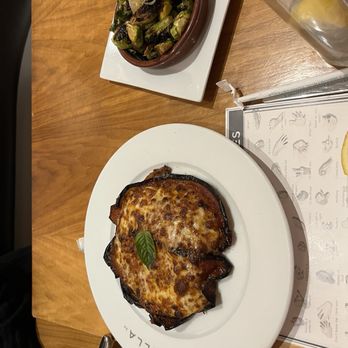 Stella 34 Trattoria - Eggplant Parmigiana with ROASTED BRUSSEL SPOUTS - Italian Near Me - New York, New York Stella 34 Trattoria - Eggplant Parmigiana with ROASTED BRUSSEL SPOUTS - Italian Near Me - New York, New York