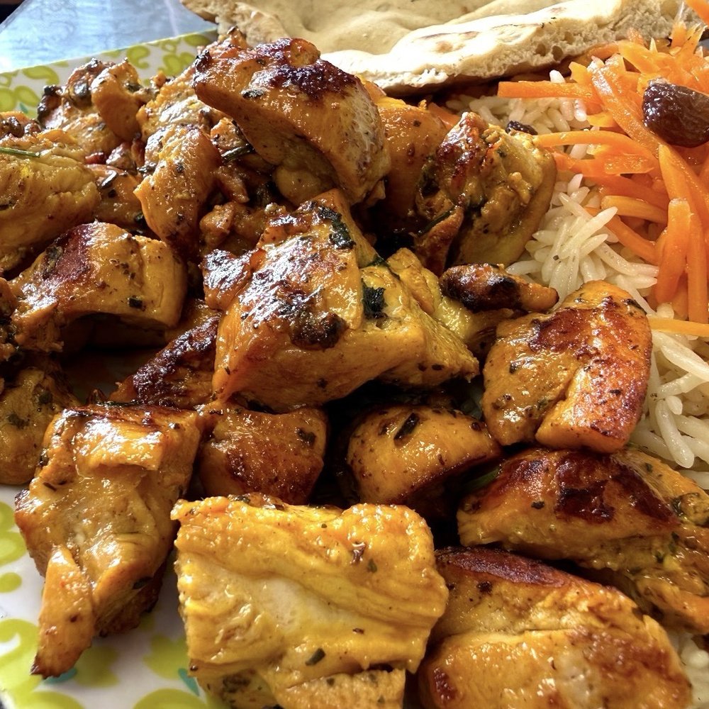 Khan Kitchen House - Tender chicken, fresh off the tandoor with just the right amount of char. - Afghan Near Me - Brook Park, Ohio Khan Kitchen House - Tender chicken, fresh off the tandoor with just the right amount of char. - Afghan Near Me - Brook Park, Ohio