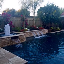 Thrilled with our new spa, pool and waterfall...