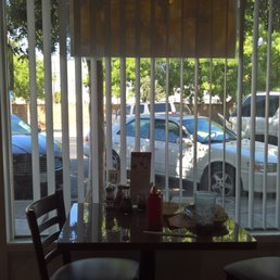 Table overlooking the sidewalk/street