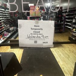 Sally Beauty - Different day different sign. Apparently they're now open at their convenience... whenever that is...