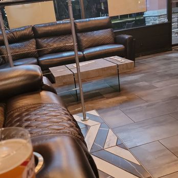 Chunk's Sports Bar - Card playing table with sofa - Sports Bars Near Me - Altamonte Springs, Florida