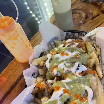 El Primo Mexican Grill - Nacho fries and red (hot) and green (mild) sauce - Mexican Near Me - Hamilton, Georgia