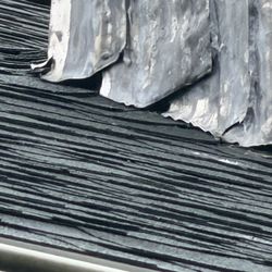 Agolli's Masonry - Chimney flashing installed April 2026