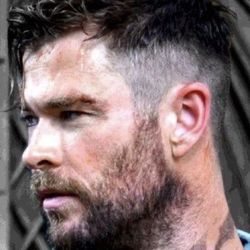 Ollie's Barbershop - Hear is a mid tapered shadow haircut