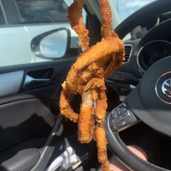 A&W - a person holding a fried squid in their hand - Fast Food Near Me - Edmonton, Alberta