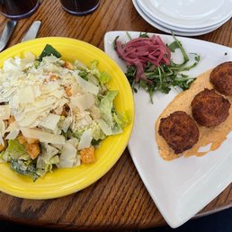 Caesar salad and crab cake hush puppies Caesar salad and crab cake hush puppies