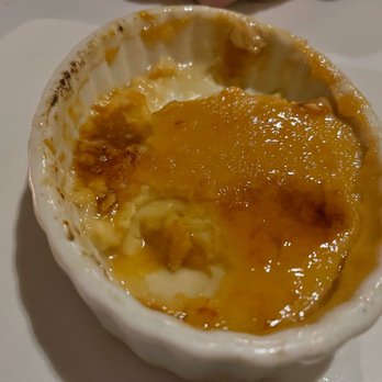 Sangria 71 - Half eaten creme brûlée on its way to being finished...delicious. - Spanish Near Me - Williston Park, New York Sangria 71 - Half eaten creme brûlée on its way to being finished...delicious. - Spanish Near Me - Williston Park, New York
