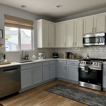 Dronen Construction - a clean kitchen with stainless steel appliances - General Contractors Near Me