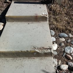 Flying Dutchman Condos - Rusty rebar exposed on broken stair corners. How much does a bag of cement cost? $3.10. HOA must be broke after the $5000+ annual meeting...