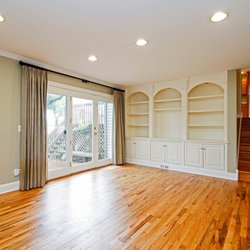 Nancy Gold - @Properties - Family room, custom built-ins, second deck overlooking trees and Gages Lake.