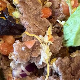 Taco salad ??? They is more like a beef patty chopped into pieces no seasoning at all Taco salad ??? They is more like a beef patty chopped into pieces no seasoning at all